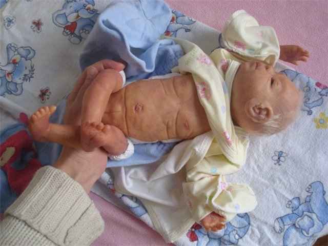 новорожденный  ребёнок  500 грамм